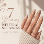 Minimal neutral nail design featuring glossy nude almond-shaped nails with soft marble accents and subtle gold shimmer details. The elegant manicure is paired with delicate gold rings and a cozy cream sweater for a chic, timeless aesthetic.