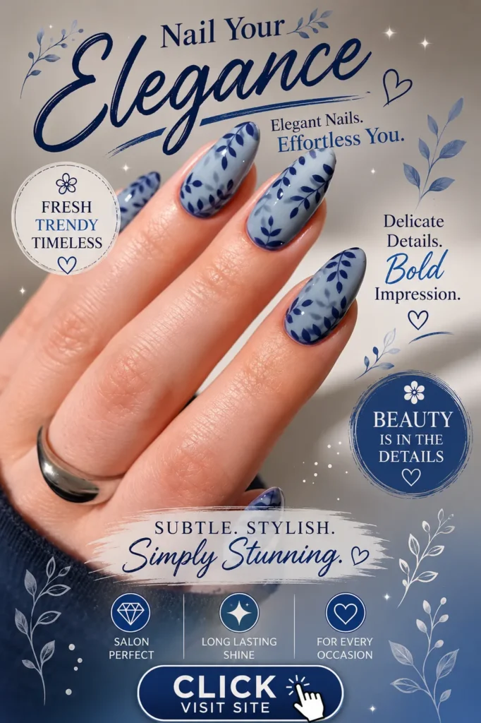 Elegant blue botanical nail art featuring almond-shaped nails with delicate leaf patterns on a soft blue background. Stylish floral manicure inspired by nature, showcasing classy nail designs, trendy nail art, and Nails 2026 Trends for a sophisticated and modern look.