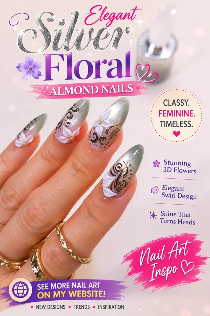 Elegant silver almond nails featuring shimmering chrome polish, 3D white floral accents, delicate swirl nail art, and a glossy finish. A luxurious floral manicure perfect for weddings, special occasions, and timeless nail inspiration.
